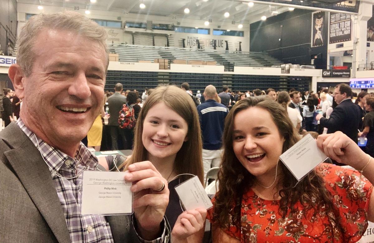 From-left-Phillip-Mink-Molly-Reed-and-Peyton-Webb-at-the-2019-Washington-DC-Law-School-Fair-at-George-Washington-University.jpg