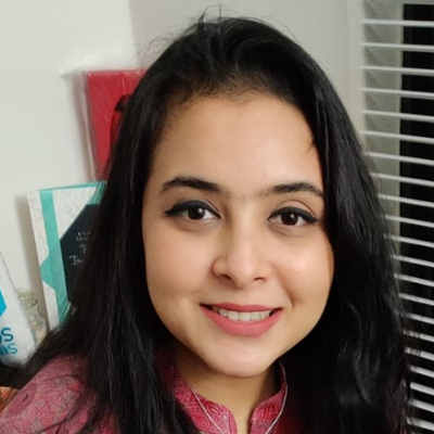 Anika Binte Islam, IST PhD student at Mason, wears a pink blouse in her profile.