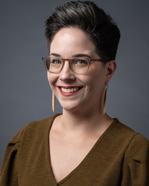 megan lavengood wearing brown shirt and glasses