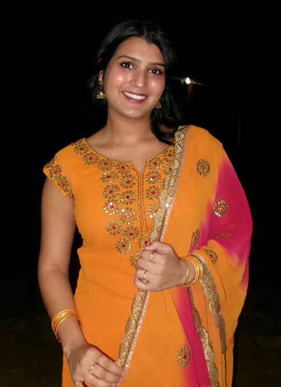Marisa Parikh smiling in South Asia attire