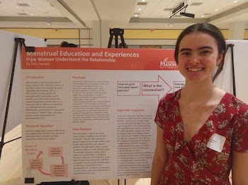 Erin Cervelli poses with her research poster