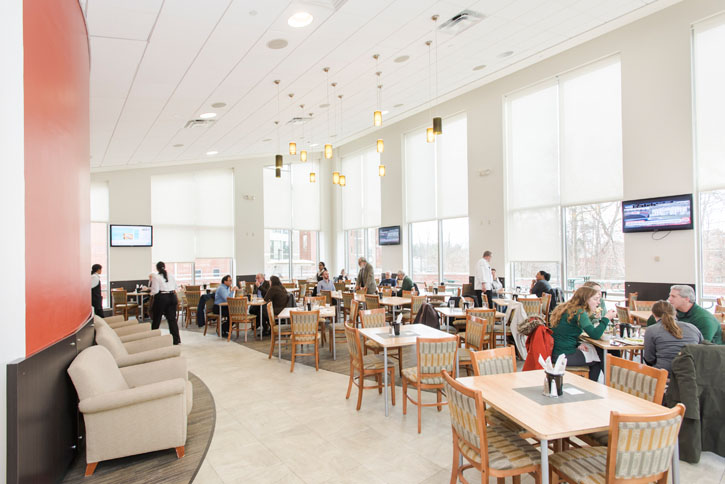 Faculty and staff enjoy the Mason Club at the renovated Pilot House on the Fairfax Campus