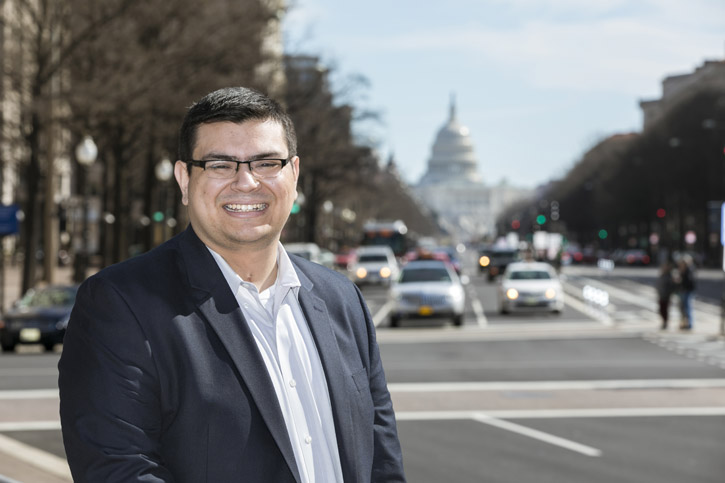 Wilberg Rivera is shown in downtown Washington, D.C. with the capitol building in the background