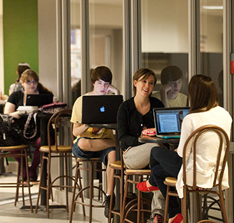 Students are sitting at tables in Johnson Center on Mason campus