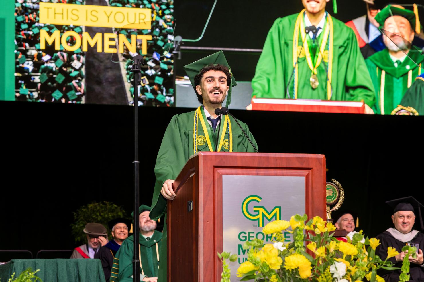 Student speaker Ayham Elayan at the podium