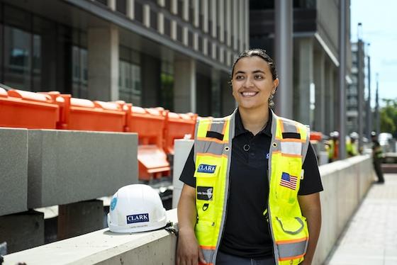 Leslie Hernandez at her Clark Construction Internship outside Fuse at MasonSquare. Photo by Cristian Torres.