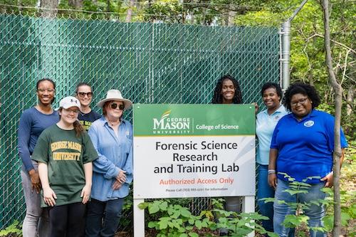 George Mason and SUNO teams with lab sign