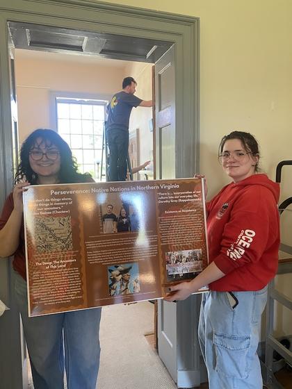 Odessa Lamborn (left) and Sinead Monaghan with their presentation. Photo by James Wells.