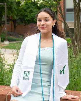 Monica Amaya wearing the EIP alumni sash.
